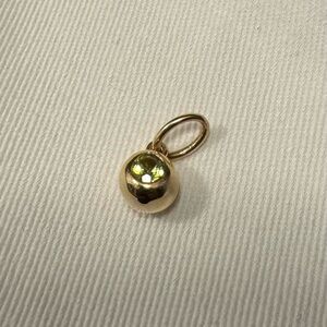 Gold Peridot Charm Pendant from Mejuri
